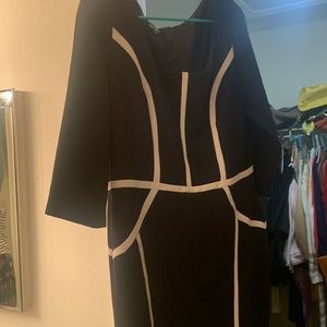 This is a Nine West size 12 gorgeous dress. No rips or tears. A great dress!